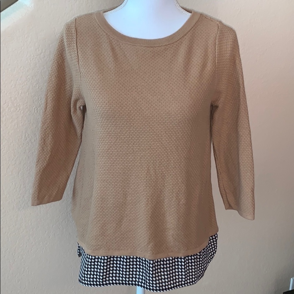 The limited sweater with tulip back